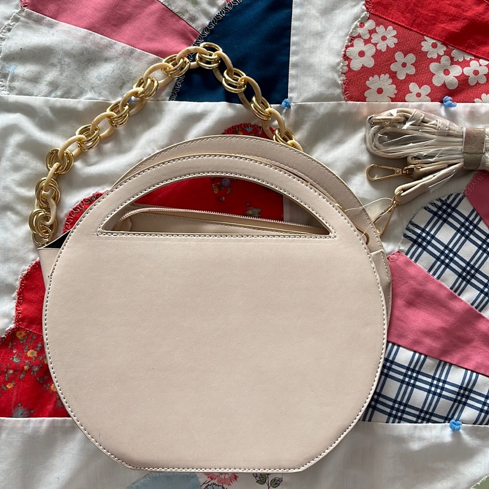 Light pink unique purse never used.